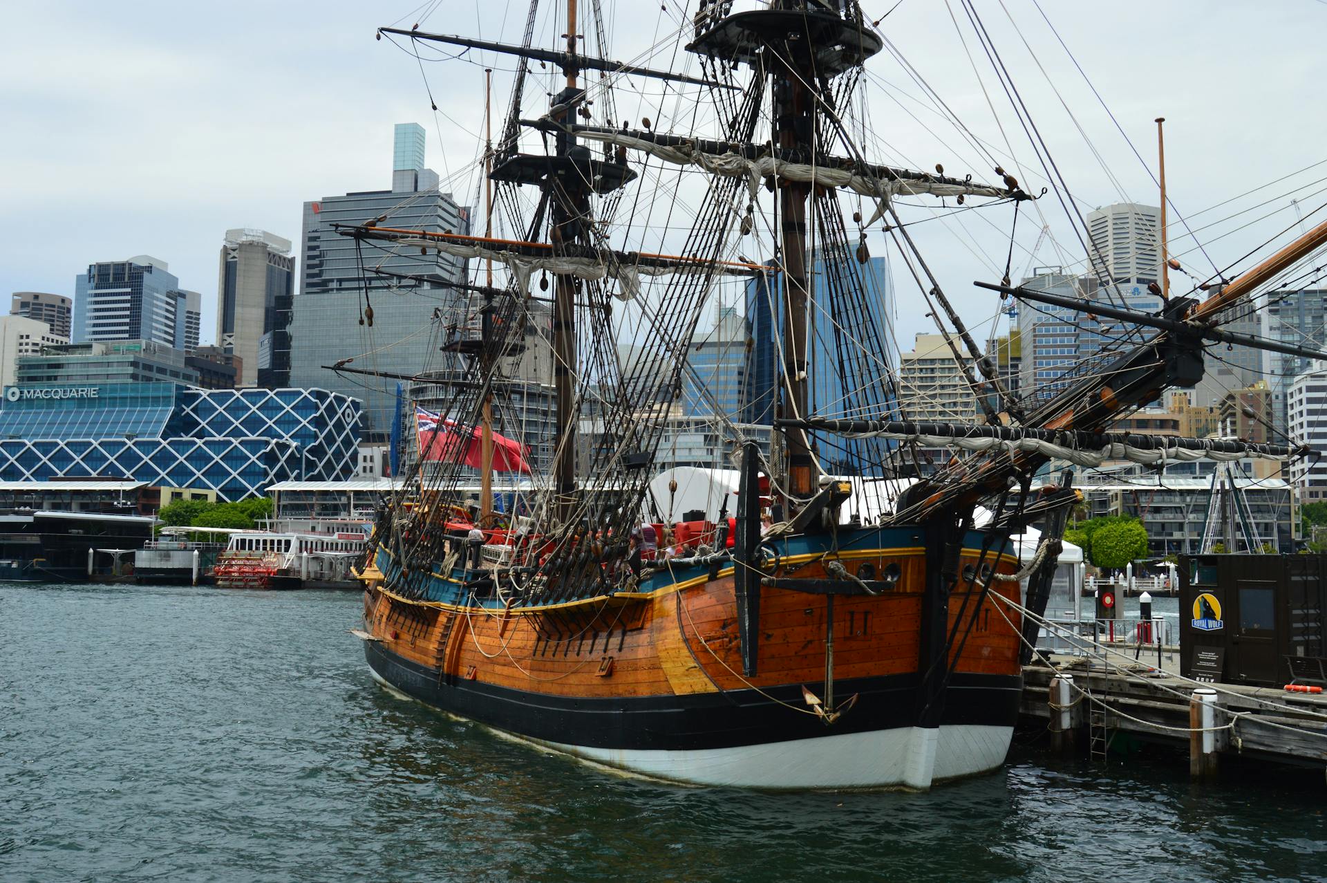 A Pirate Ship Docked at a Harbor