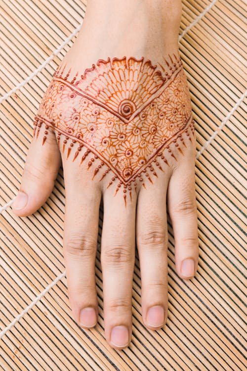 Free Person's Hand with Henna Tattoo Stock Photo