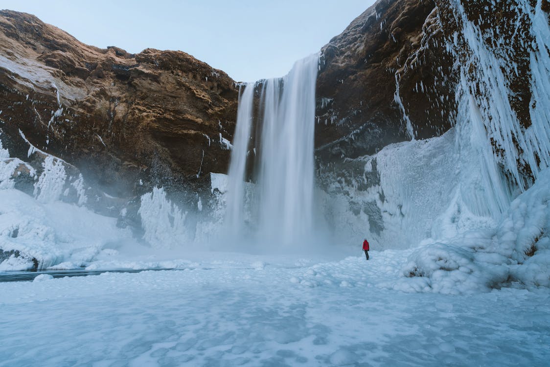 Free Person Walking on Snowfield Stock Photo