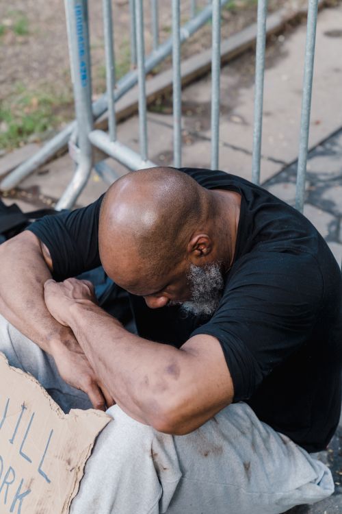 Person Giving Alms to the Poor · Free Stock Photo