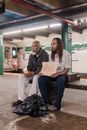 Man and Woman Sitting on Bench