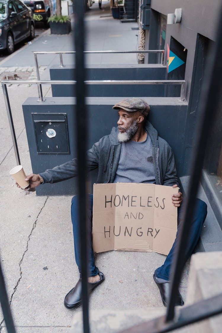 A Man Asking For Alms