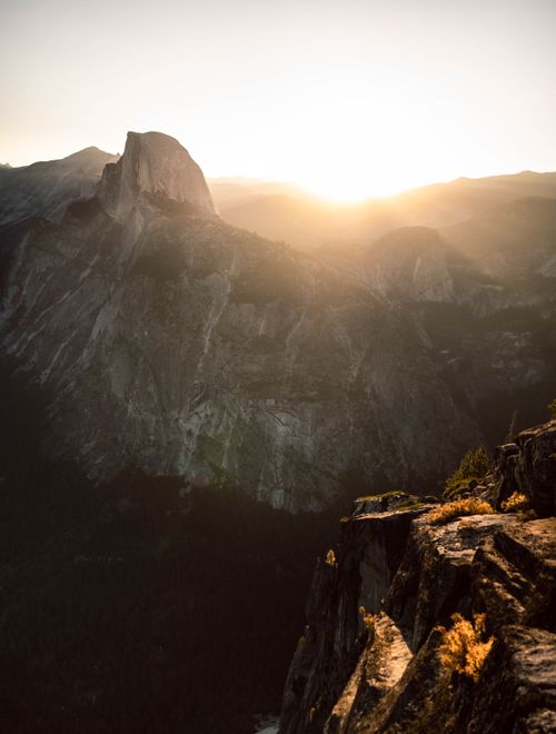 Free Breathtaking aerial view capturing sunrise over Half Dome in Yosemite National Park. Stock Photo