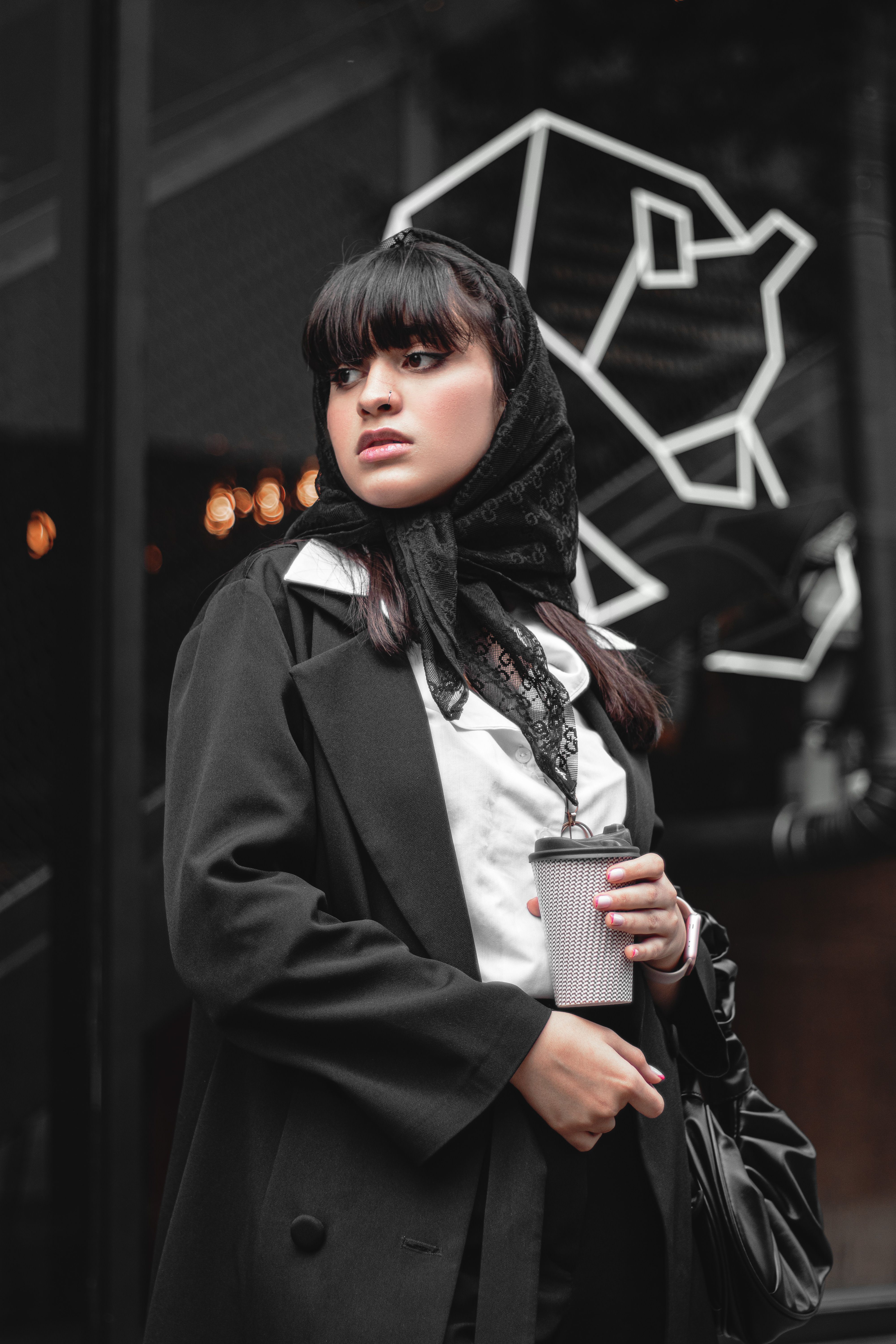 Woman in Black Coat Holding White and Black Ceramic Mug · Free Stock Photo