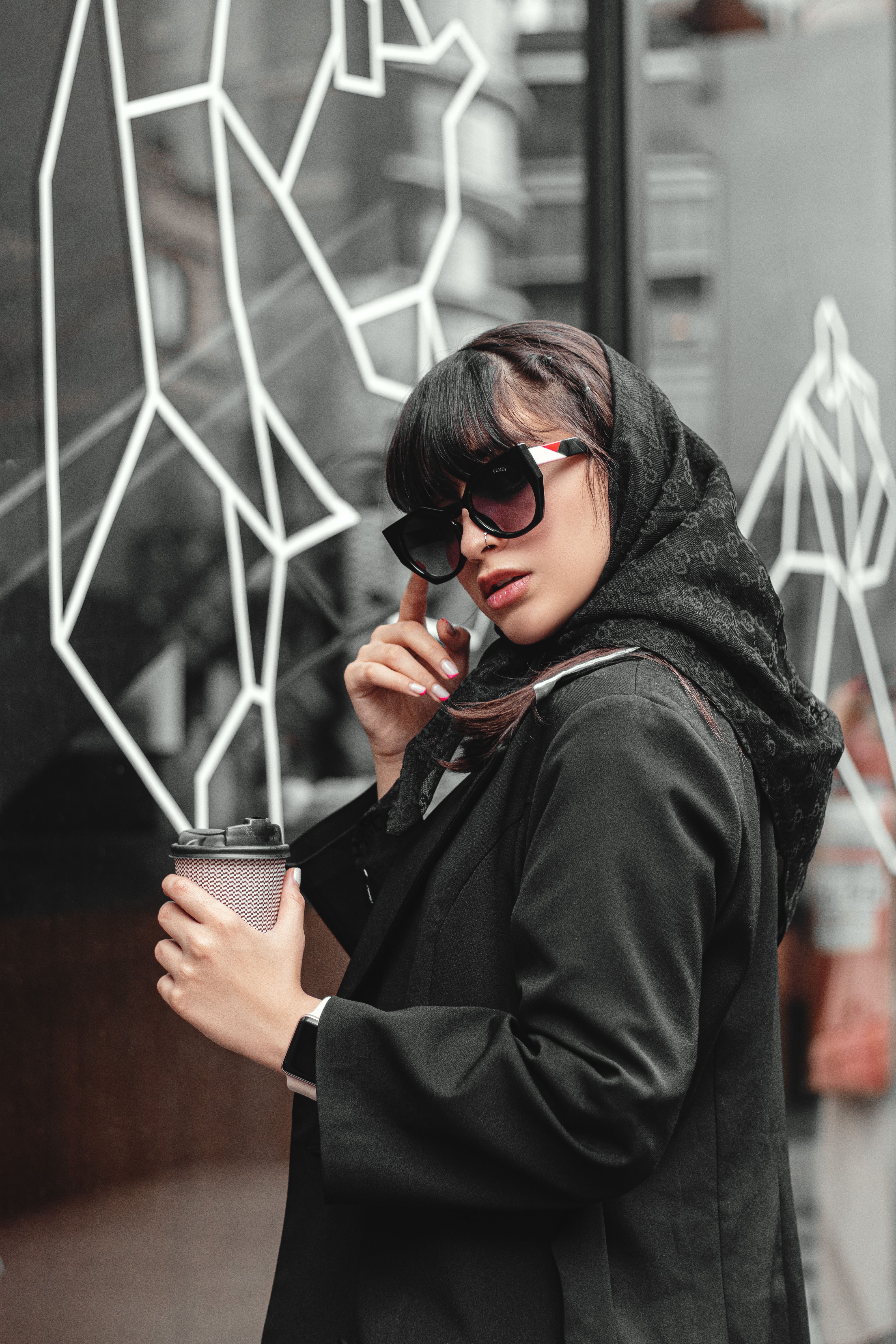 Woman in Black Coat Holding Black and Silver Camera · Free Stock Photo