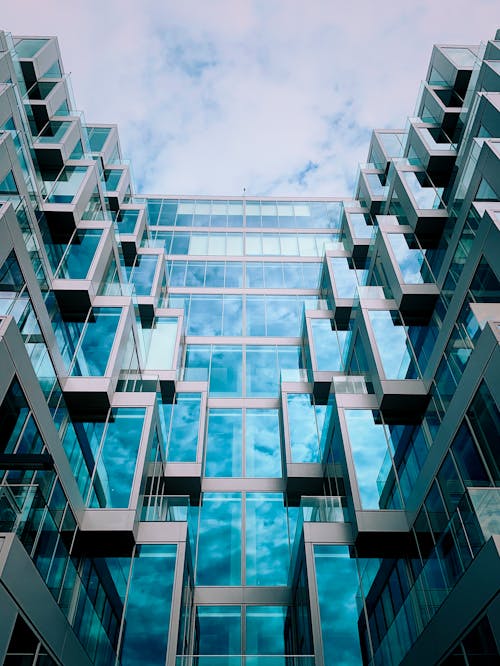 Low Angle Photography of Modern Glass Building