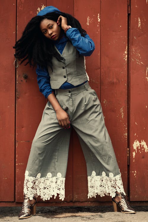 Woman Wearing Gray Coat and White Crop Top on Staircase ... - 500 x 750 jpeg 52kB