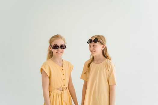 Woman in Brown Button Up Shirt Wearing Black Sunglasses
