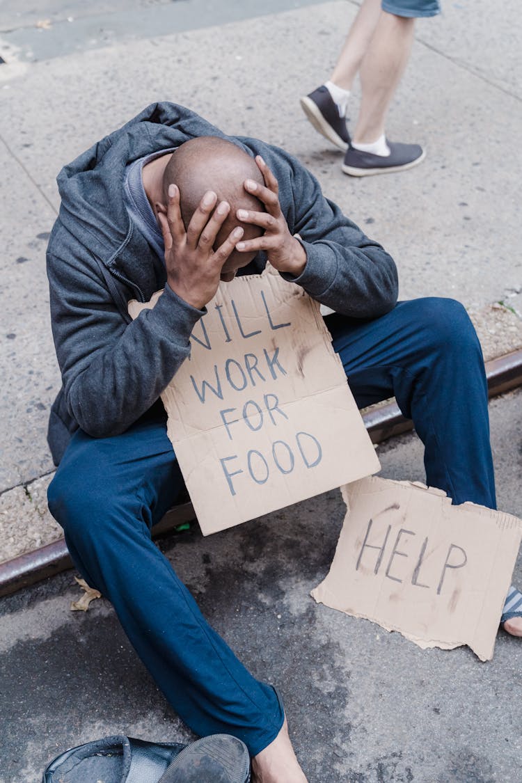 A Man Asking For Alms