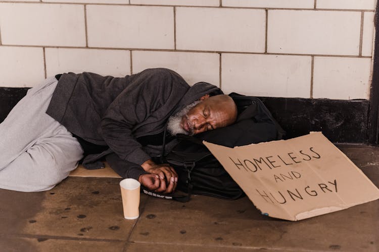 Man Sleeping On Floor