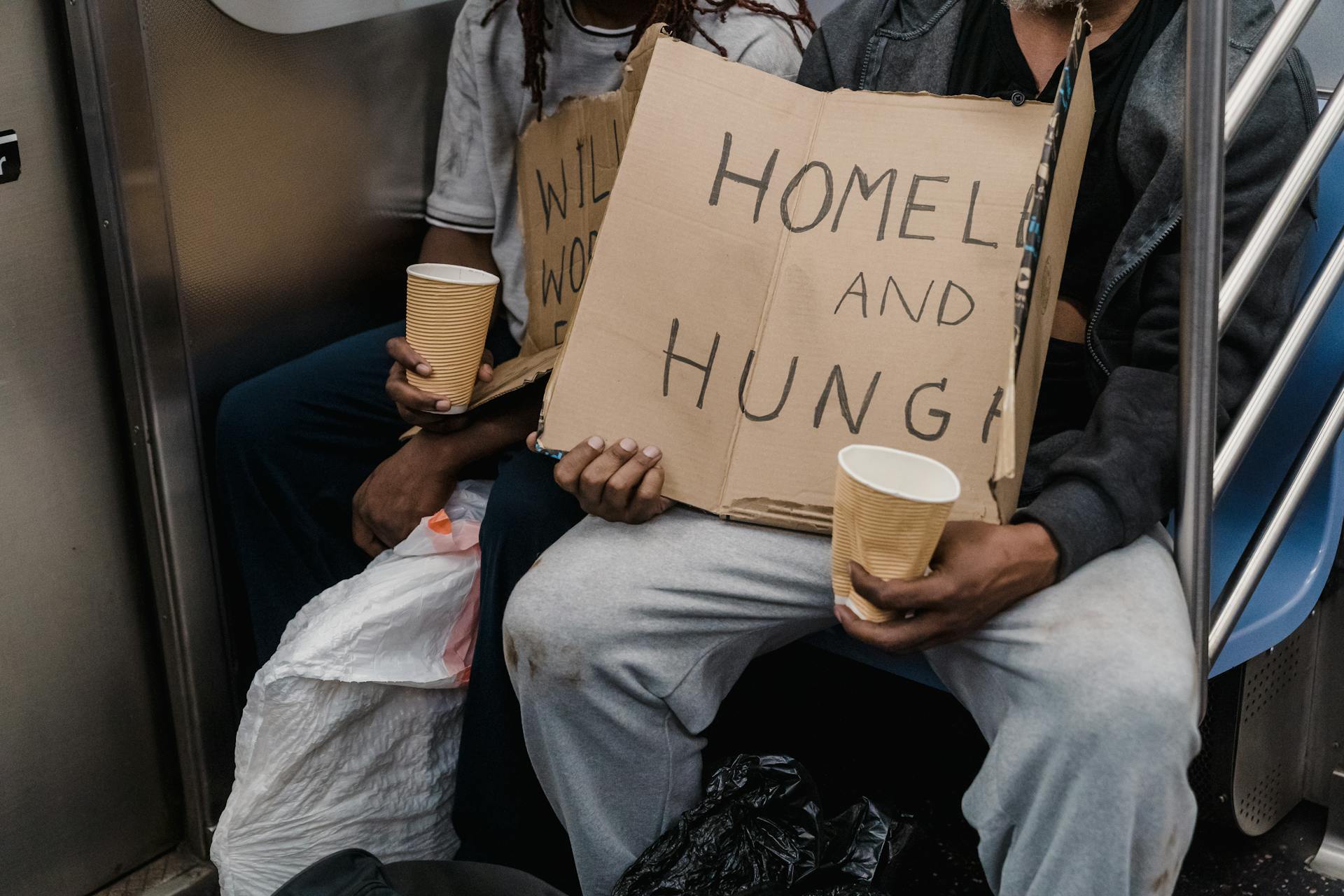 Homeless People Holding Signs