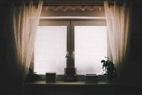 Brown Curtain Near White 2-pane Window