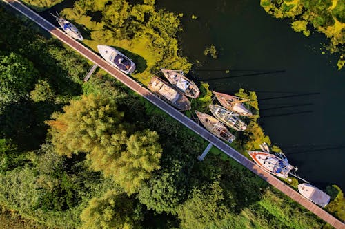 Drone Shot of Yachts Beside a Boardwalk