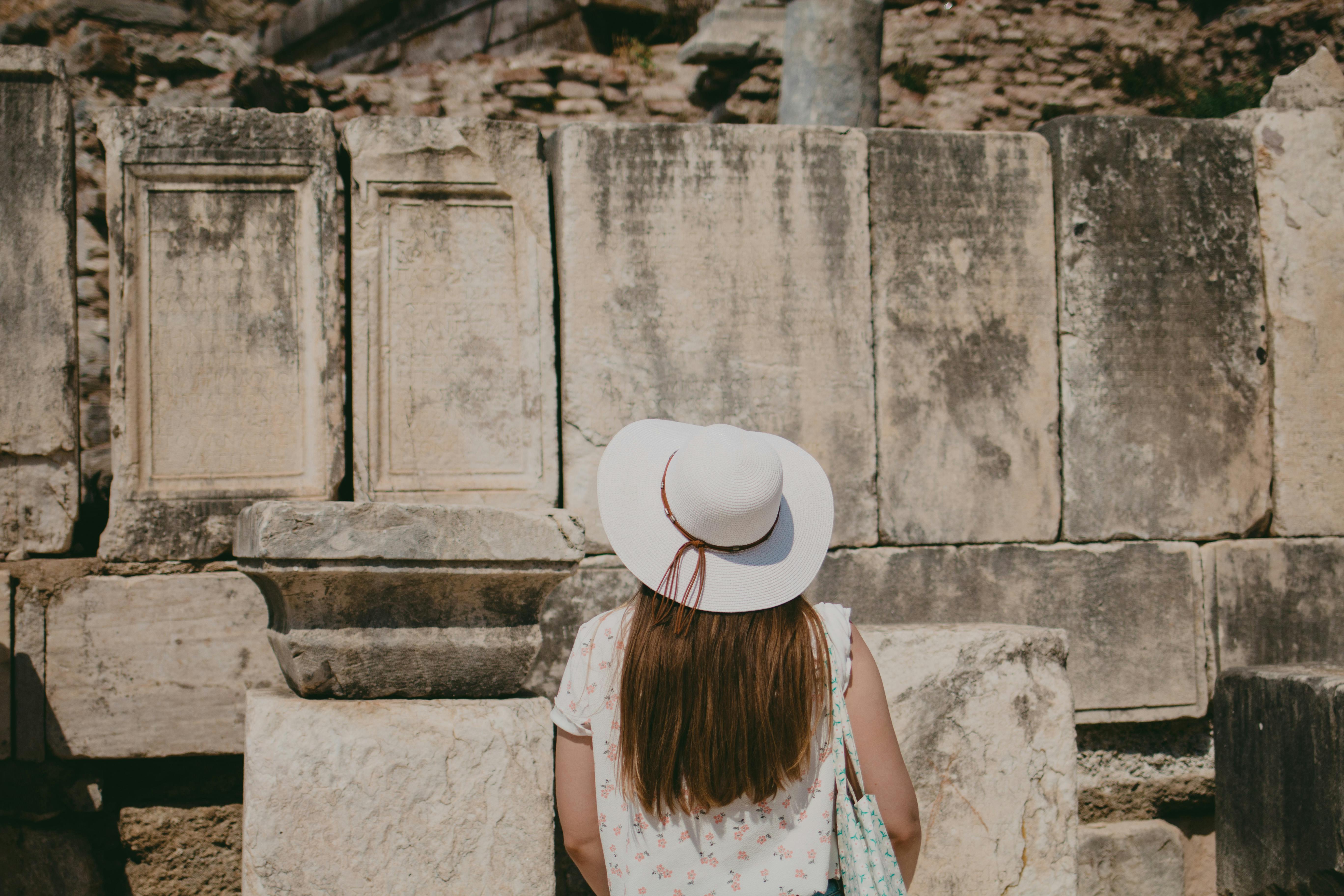 A solo traveler exploring ancient ruins - cultural gems single adventurers