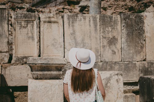 Back View of a Woman Wearing Sun Hat