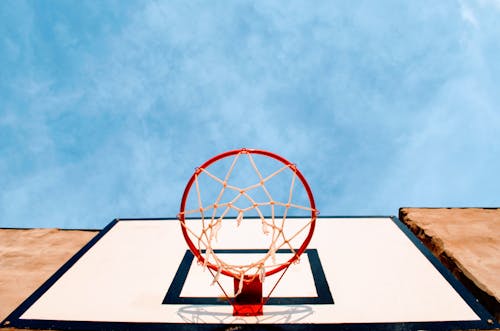 Low-Angle Shot of a Red Hoop with a White Net