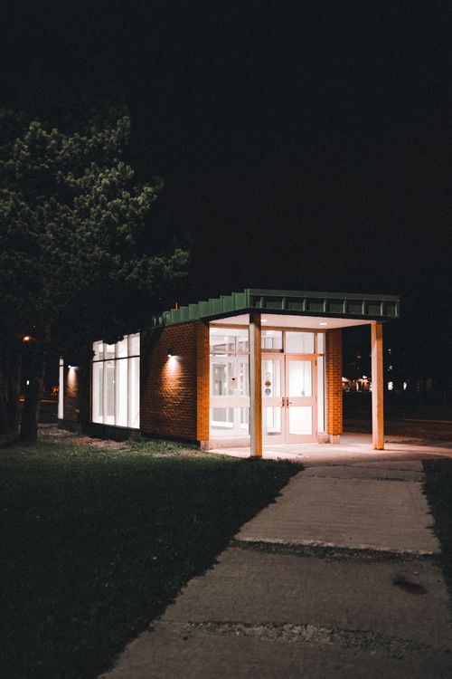 Building and Sidewalk at Night · Free Stock Photo