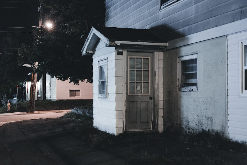 Mysterious speakeasy entrance with dim lighting and vintage door - bars in uptown Mysterious speakeasy entrance with dim lighting and vintage door - bars in uptown