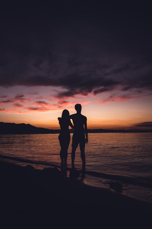 Silhouette of a Couple in the Beach