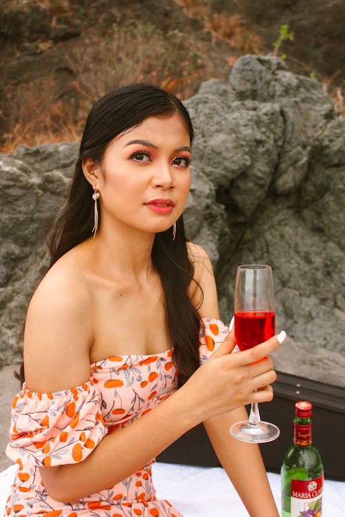 Brunette Woman Holding Wine Glass