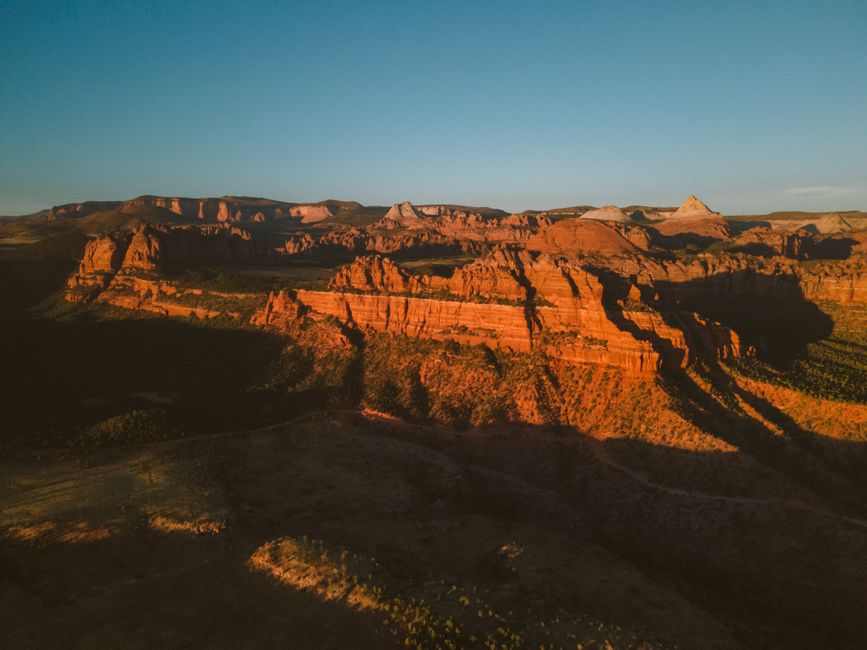 Breathtaking 35 Mile - Zion National Park Panoramic Helicopter Flight Review 2026 - A stunning aerial view of Utah's red rock formations glowing at sunset.