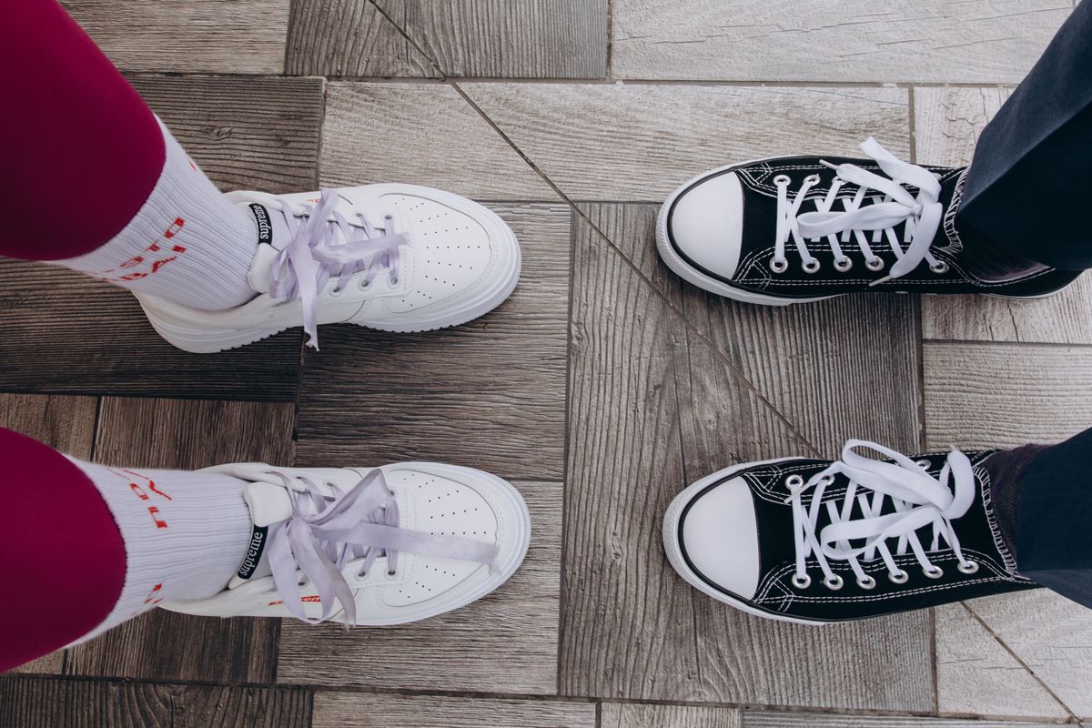 Pair of supportive athletic sneakers on the floor, the type recommended before using an inversion table