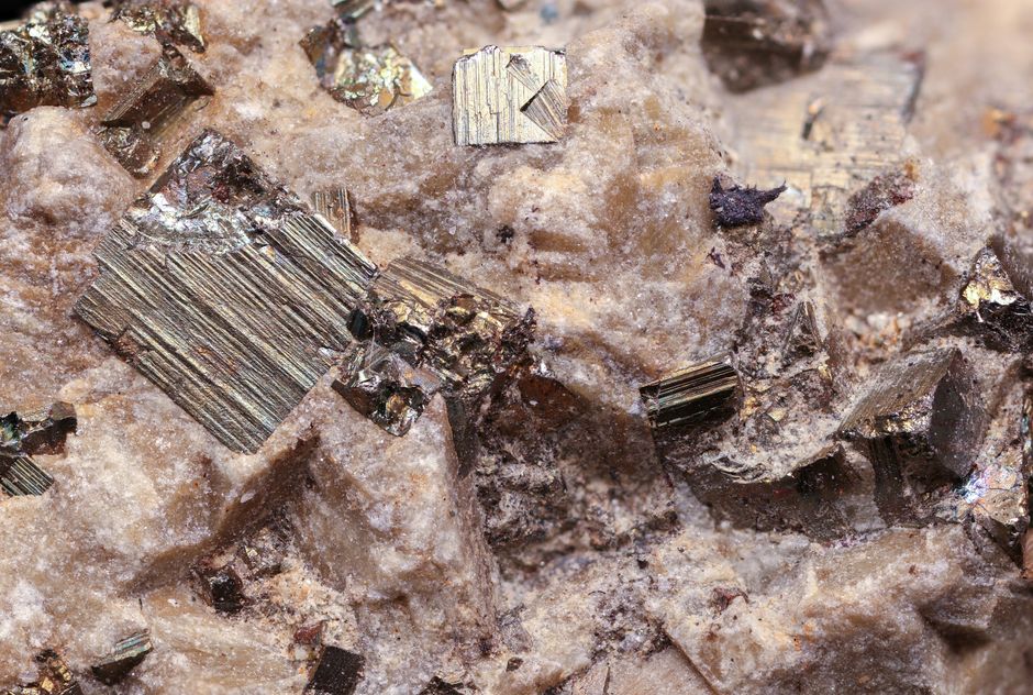 Rough flux grown crystal compared to faceted gemstone Rough flux grown crystal compared to faceted gemstone