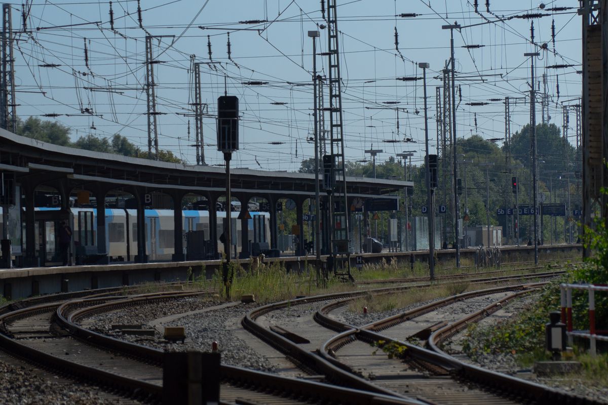 Railway tracks leading away from a station