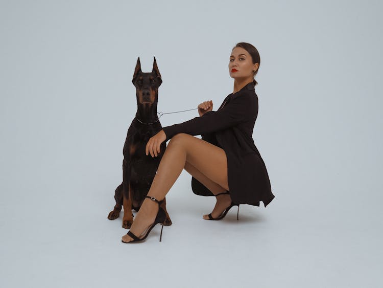 Fierce Woman And Dog Doing A Photoshoot