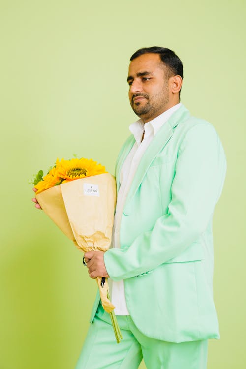 A Man Holding Sunflower Bouette