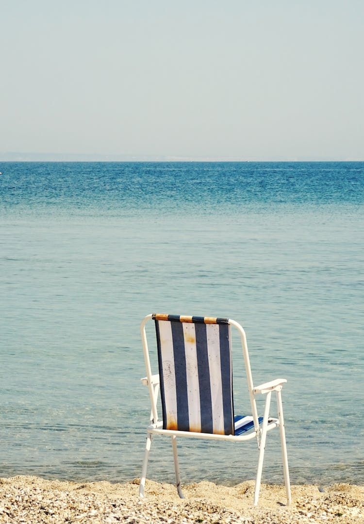 Folding Chair On The Beach