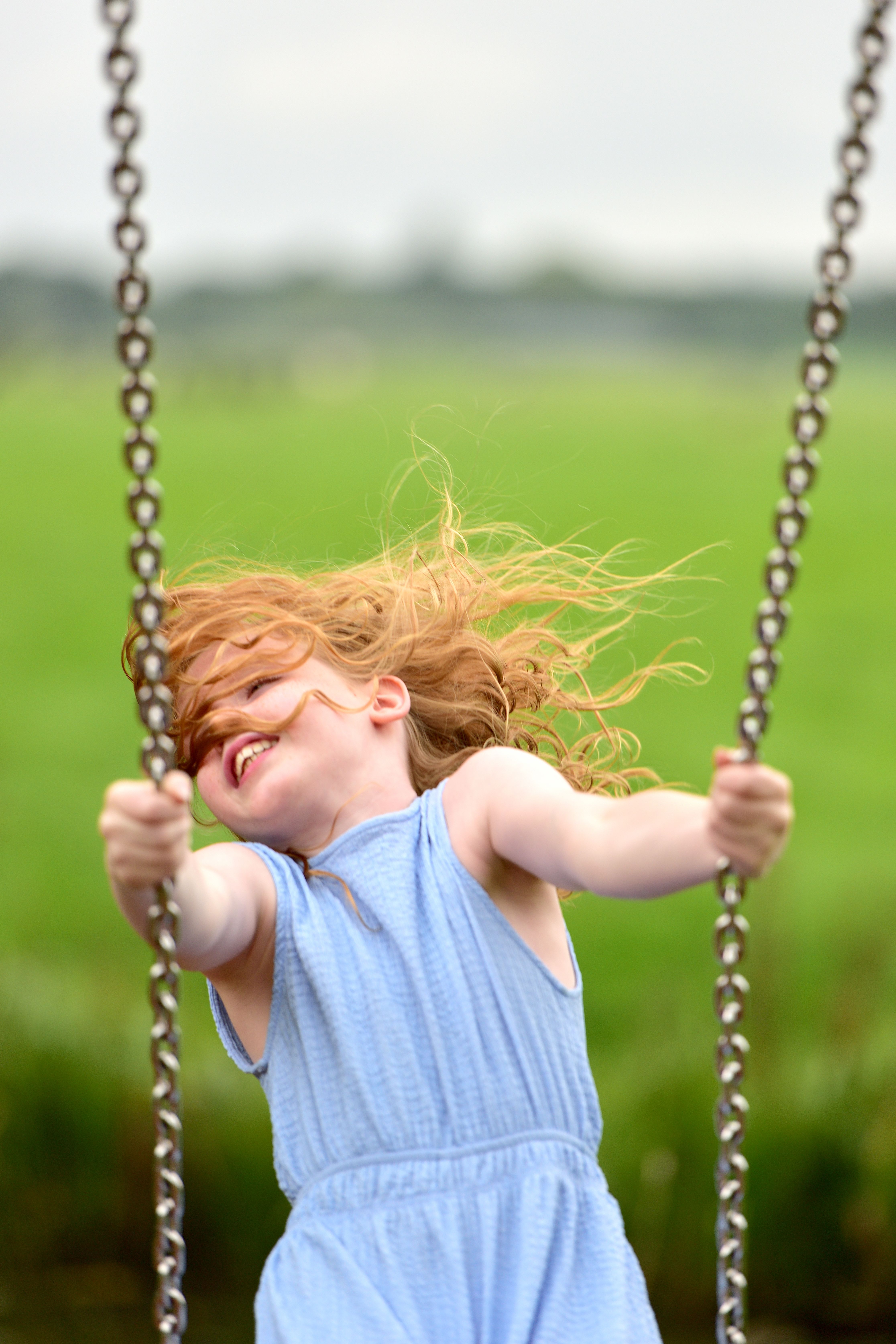 Girl in Blue Dress on Swing · Free Stock Photo