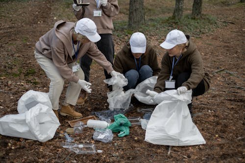 Free Group of People doing an Environmental Cleanup  Stock Photo