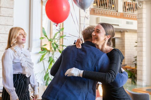 Happy Woman hugging her Friend 