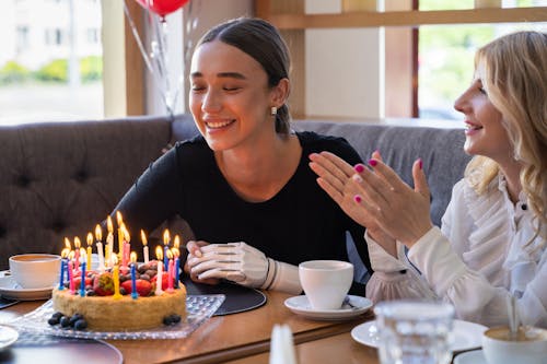 Free Woman making her Birthday Wishes  Stock Photo