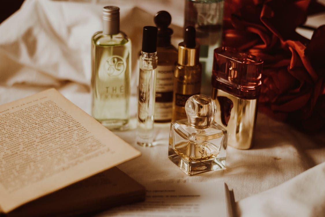 Free Bottles of Perfumes over a Table Stock Photo