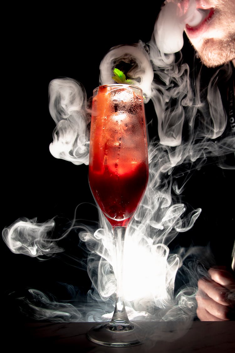 Man Face And Smoke Around Drink