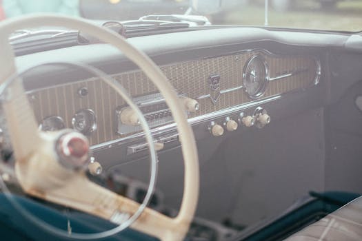 Elegant vintage car interior showcasing a timeless dashboard design.