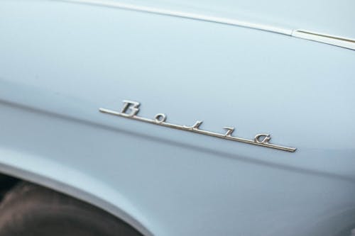 Kostnadsfri bild av blå bil, chrome, emblem