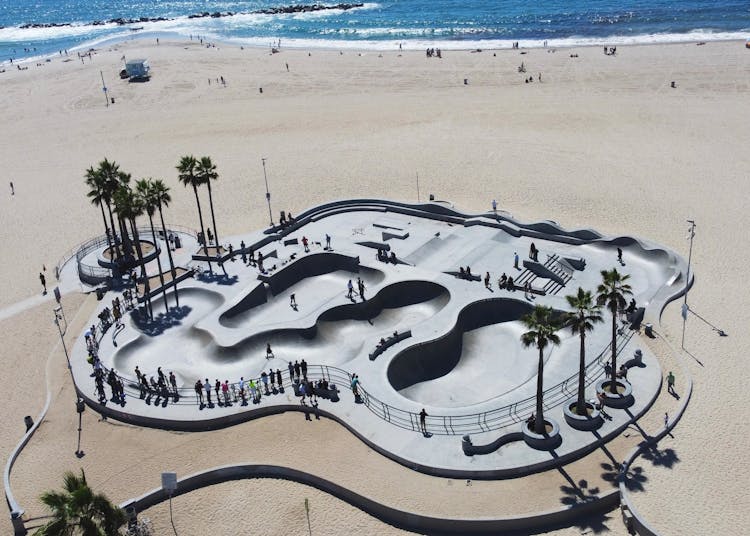 
An Aerial View Of A Skatepark On A Beach