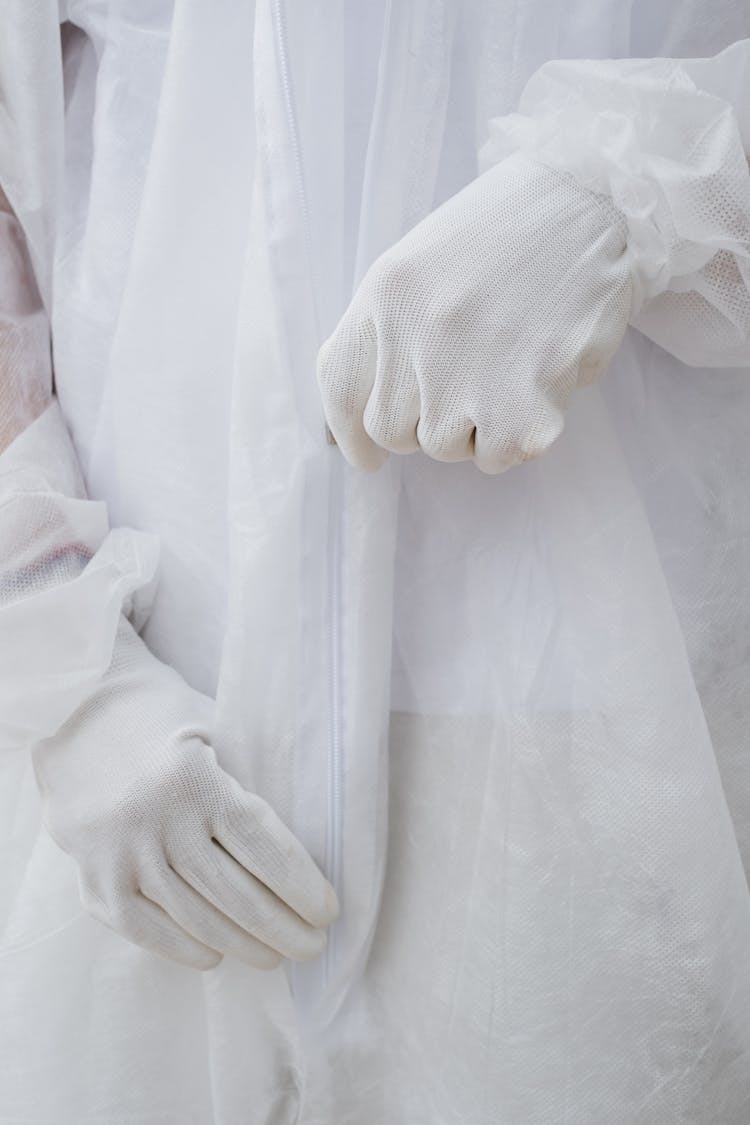 Close-up Photo Of Person Wearing Hazmat Suit 