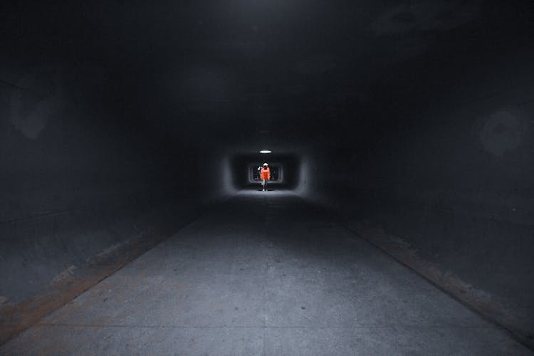 A Person Inside A Tunnel