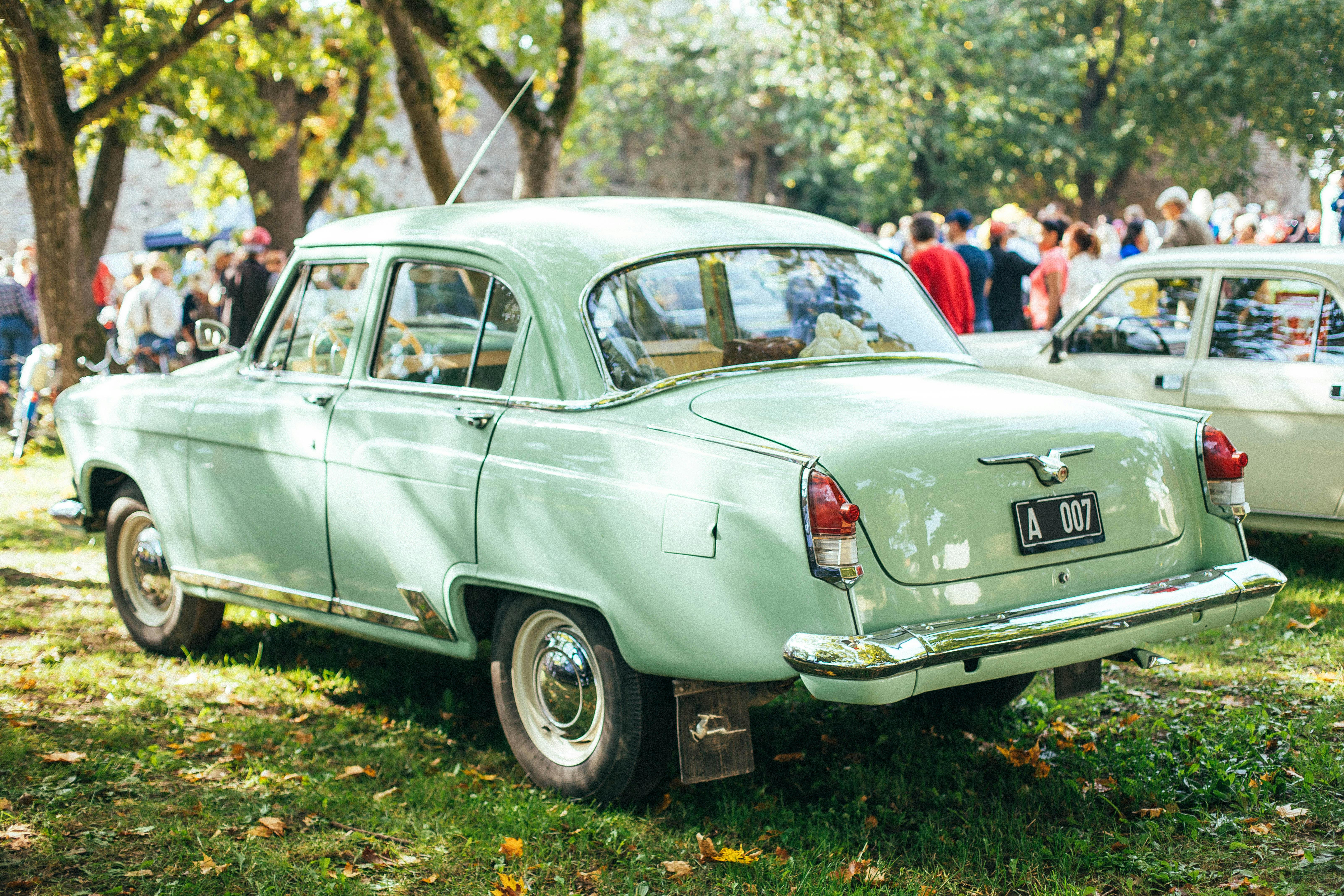 Light Green Classic Car on a Car Show · Free Stock Photo