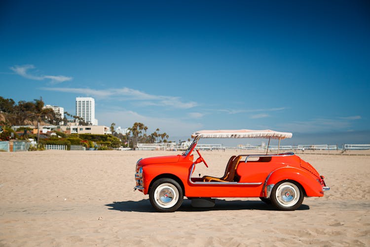 Sightseeing Car At Beach