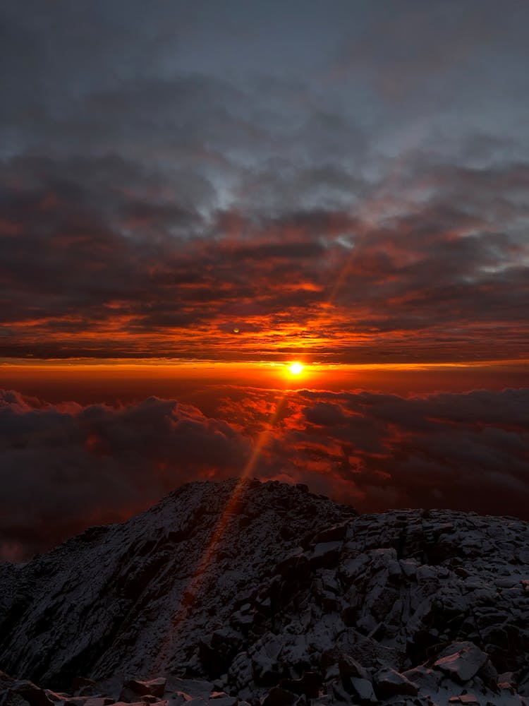 View Of The Sunrise Above The Mountains