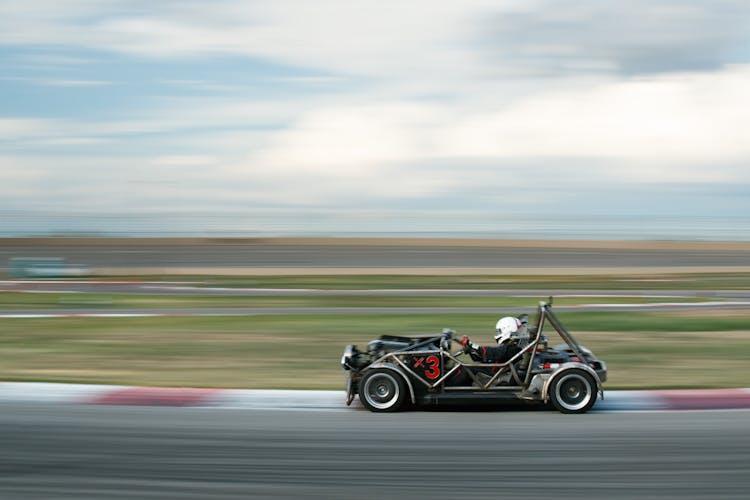 Driving A Racing Car On Track