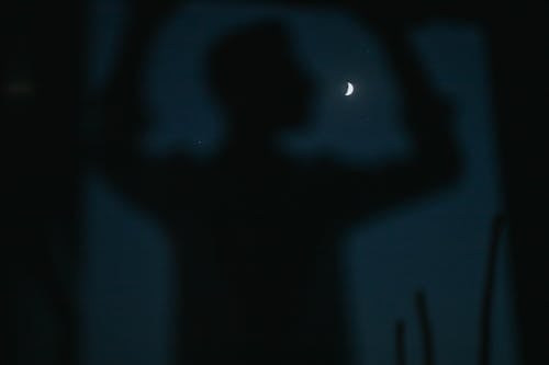 Free Silhouette of a Man During the Night Stock Photo