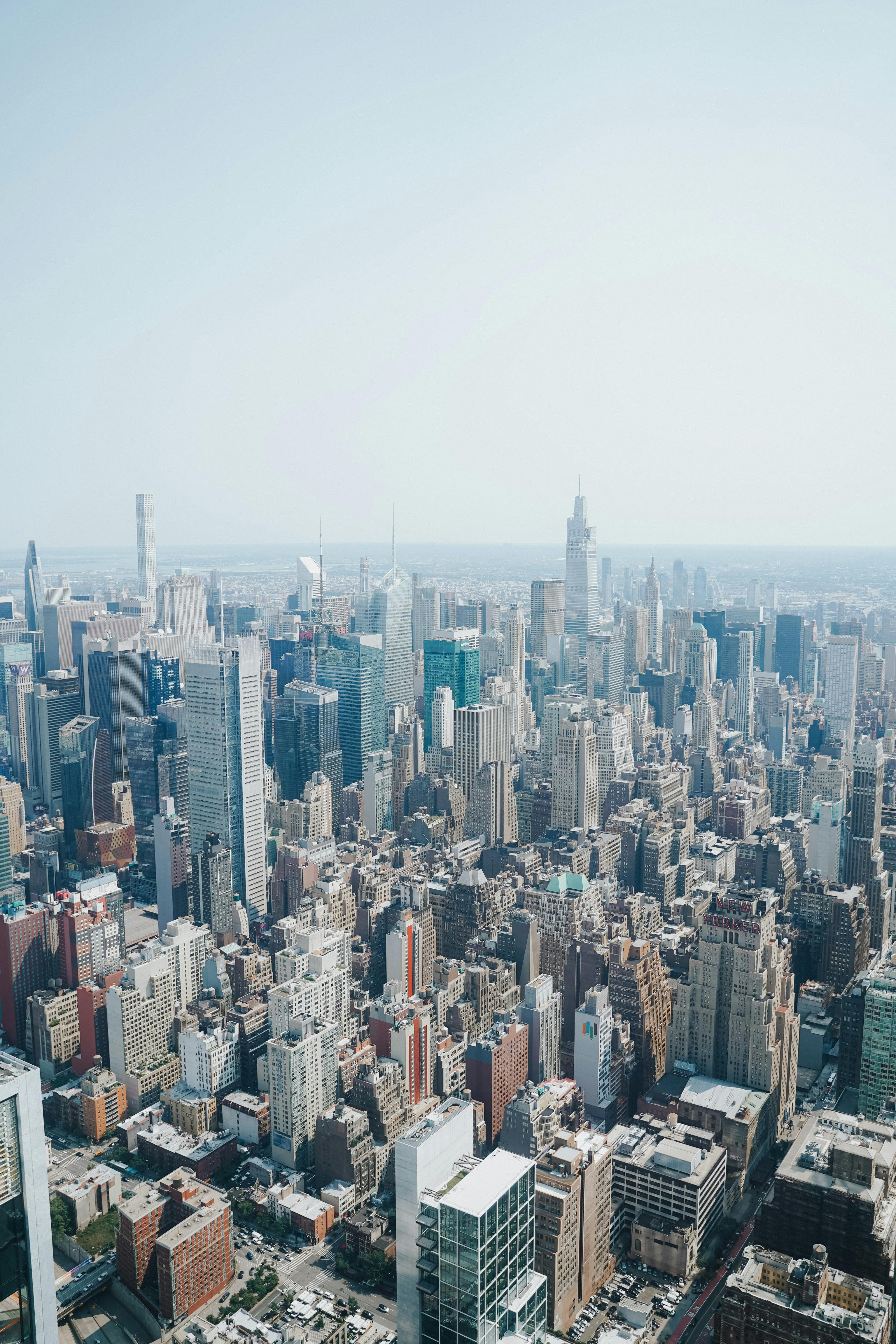 Explore the iconic New York City skyline from above with stunning skyscrapers and urban landscape.