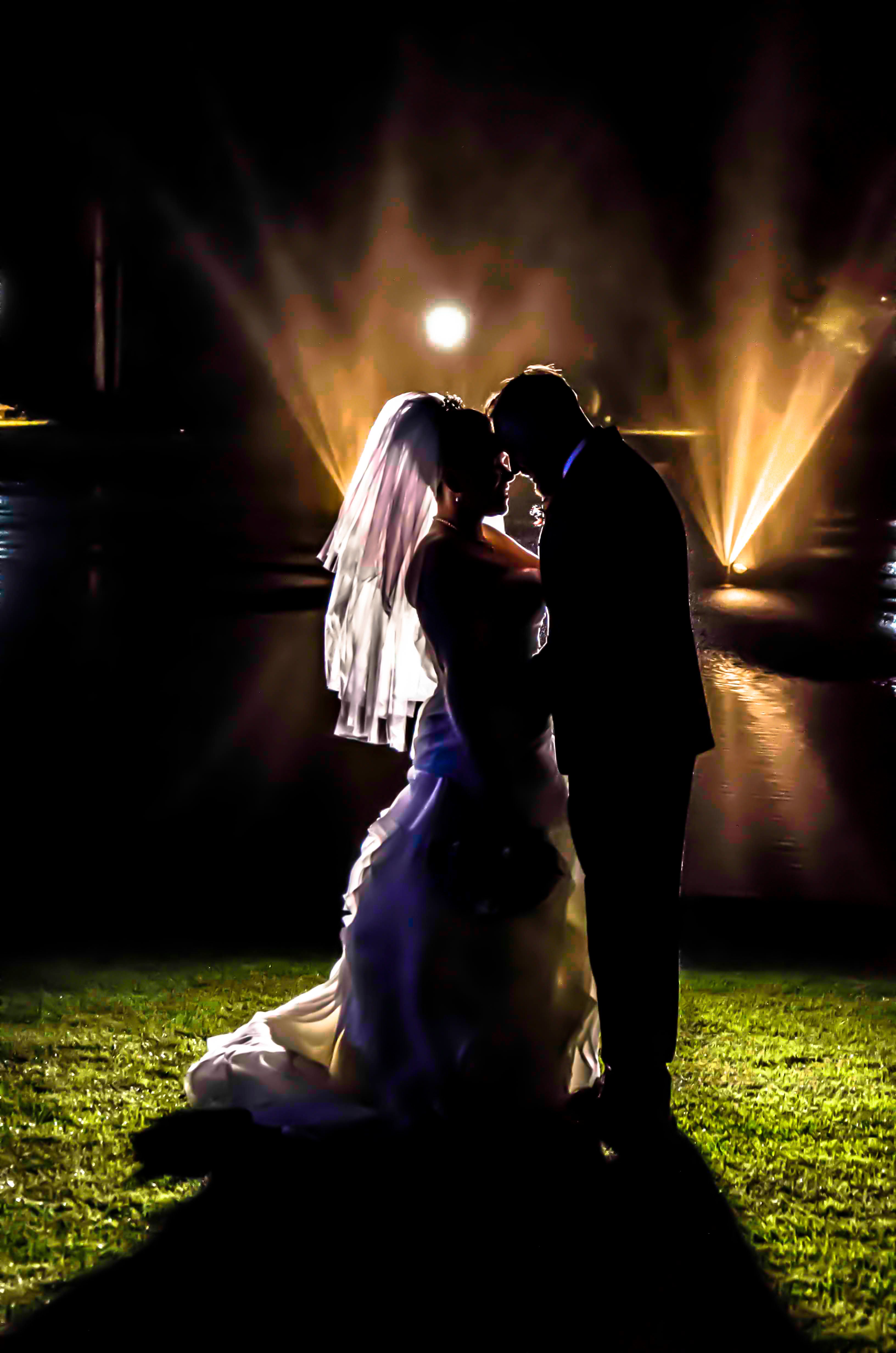 Silhouette of Bride and Groom on Grass Field during Night Times · Free ...