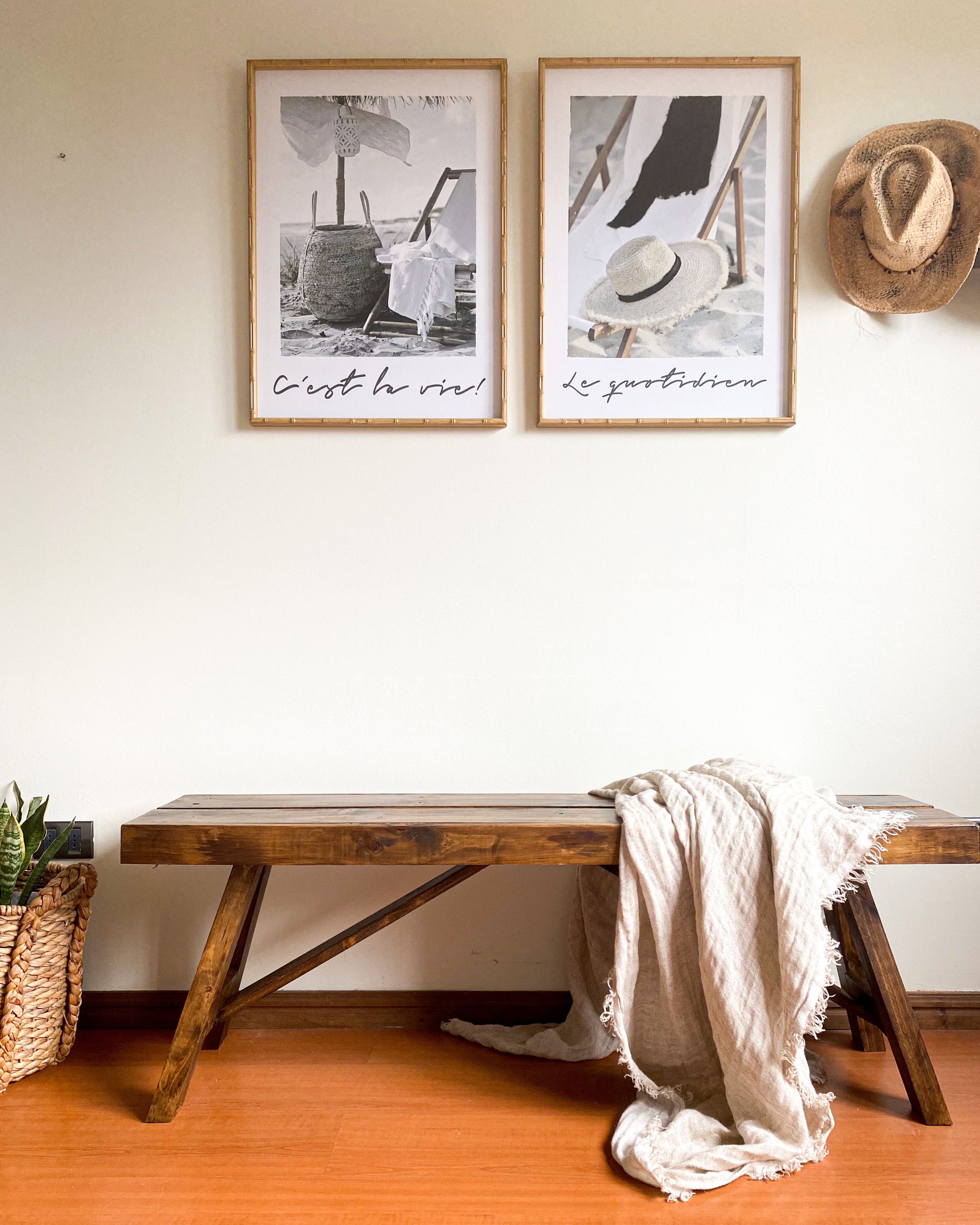 Elegant wooden bench with decor against a modern minimalist wall, perfect for cozy interiors.